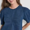 Camisa con mangas abullonadas y fruncido en la parte delantera