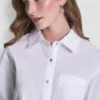 Camisa de popelín con botones de pedrería