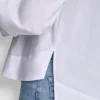 Camisa de popelín con botones de pedrería