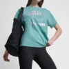 Camiseta con logo DKNY 1989 y tachuelas Camiseta con logo DKNY 1989 y tachuelas