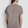Camiseta con logo DKNY 1989 y tachuelas Camiseta con logo DKNY 1989 y tachuelas