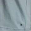 Camiseta con mini volantes y tachuelas Camiseta con mini volantes y tachuelas