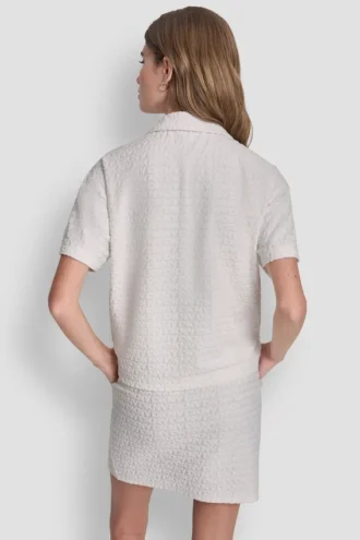 Camiseta polo holgada con logo jacquard