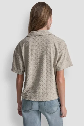Camiseta polo holgada con logo jacquard