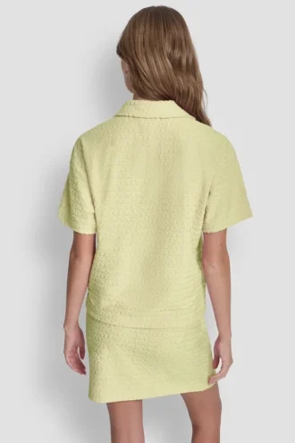 Camiseta polo holgada con logo jacquard