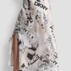 Falda midi con estampado de periódico