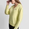 Jersey de cuello en V con logotipo metálico en relieve Jersey de cuello en V con logotipo metálico en relieve