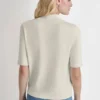 Jerséis con cuello alto y logotipo Jerséis con cuello alto y logotipo