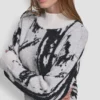 Jerséis oversize con intrincados detalles Jerséis oversize con intrincados detalles