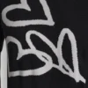Jerséu de manga corta con corazones grafiti