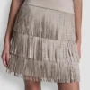 Minifalda con flecos y tachuelas