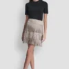 Minifalda con flecos y tachuelas