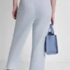 Pantalones cortos de talle alto con logotipo metálico en burbujas Pantalones cortos de talle alto con logotipo metálico en burbujas