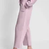 Pantalones cortos de talle alto con logotipo metálico en burbujas Pantalones cortos de talle alto con logotipo metálico en burbujas