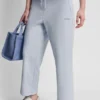 Pantalones cortos de talle alto con logotipo metálico en burbujas Pantalones cortos de talle alto con logotipo metálico en burbujas