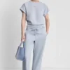 Pantalones cortos de talle alto con logotipo metálico en burbujas Pantalones cortos de talle alto con logotipo metálico en burbujas