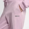 Pantalones cortos de talle alto con logotipo metálico en burbujas Pantalones cortos de talle alto con logotipo metálico en burbujas