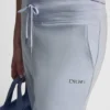 Pantalones cortos de talle alto con logotipo metálico en burbujas Pantalones cortos de talle alto con logotipo metálico en burbujas