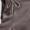 Pantalones cortos de talle alto con logotipo metálico en burbujas Pantalones cortos de talle alto con logotipo metálico en burbujas