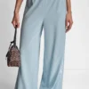 Pantalones de pierna ancha con rayas de lentejuelas Pantalones de pierna ancha con rayas de lentejuelas