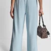 Pantalones de pierna ancha con rayas de lentejuelas Pantalones de pierna ancha con rayas de lentejuelas