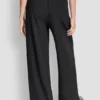 Pantalones de talle alto y pierna ancha Pantalones de talle alto y pierna ancha