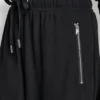 Pantalones de talle alto y pierna ancha Pantalones de talle alto y pierna ancha