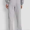 Pantalones jogger de talle alto con logo universitario de pedrería en relieve con corte holgado