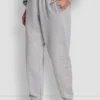 Pantalones jogger de talle alto con logo universitario de pedrería en relieve con corte holgado