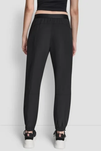 Pantalones Jogger de talle extraalto con logo en la cintura y pierna ancha