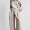 Pantalones plisados a rayas Pantalones plisados a rayas