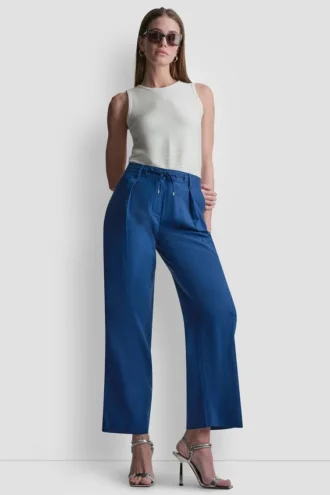 Pantalones plisados de cintura media con cinturilla con lazo