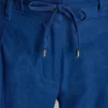 Pantalones plisados de cintura media con cinturilla con lazo Pantalones plisados de cintura media con cinturilla con lazo