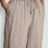 Pantalones sin cremallera de pierna ancha con costuras Pantalones sin cremallera de pierna ancha con costuras