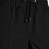 Pantalones sin cremallera de pierna ancha con costuras Pantalones sin cremallera de pierna ancha con costuras