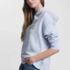 Sudadera con capucha y logotipo de pedrería superpuesto