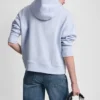 Sudadera con capucha y logotipo de pedrería superpuesto
