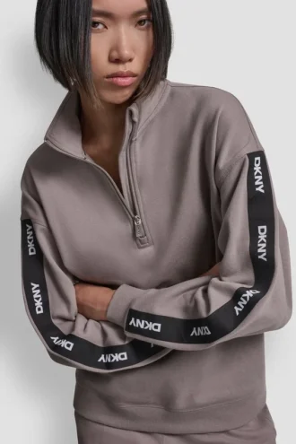 Sudadera con logo y cremallera de un cuarto