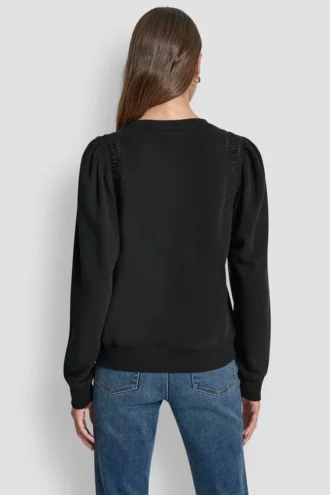 Sudadera con mangas abullonadas y detalles de encaje