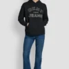 Sudadera DKNY Vaqueros con logotipo bordado en satén y puntada de cadena Sudadera DKNY Vaqueros con logotipo bordado en satén y puntada de cadena