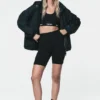 Chaqueta bomber de cuello alto con capucha
