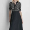 Vestido camisero midi ajustado y acampanado Vestido camisero midi ajustado y acampanado