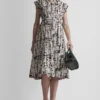 Vestido camisero midi con mangas casquillo Vestido camisero midi con mangas casquillo