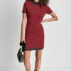 Vestido corto de cuello alto con mangas de ballet y estampado jacquard con logotipo Vestido corto de cuello alto con mangas de ballet y estampado jacquard con logotipo