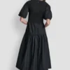 Vestido midi de punto elástico con cuello Henley y mangas abullonadas Vestido midi de punto elástico con cuello Henley y mangas abullonadas