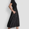 Vestido midi tipo burbuja con bolsillos cargo de mezcla de tejidos Vestido midi tipo burbuja con bolsillos cargo de mezcla de tejidos